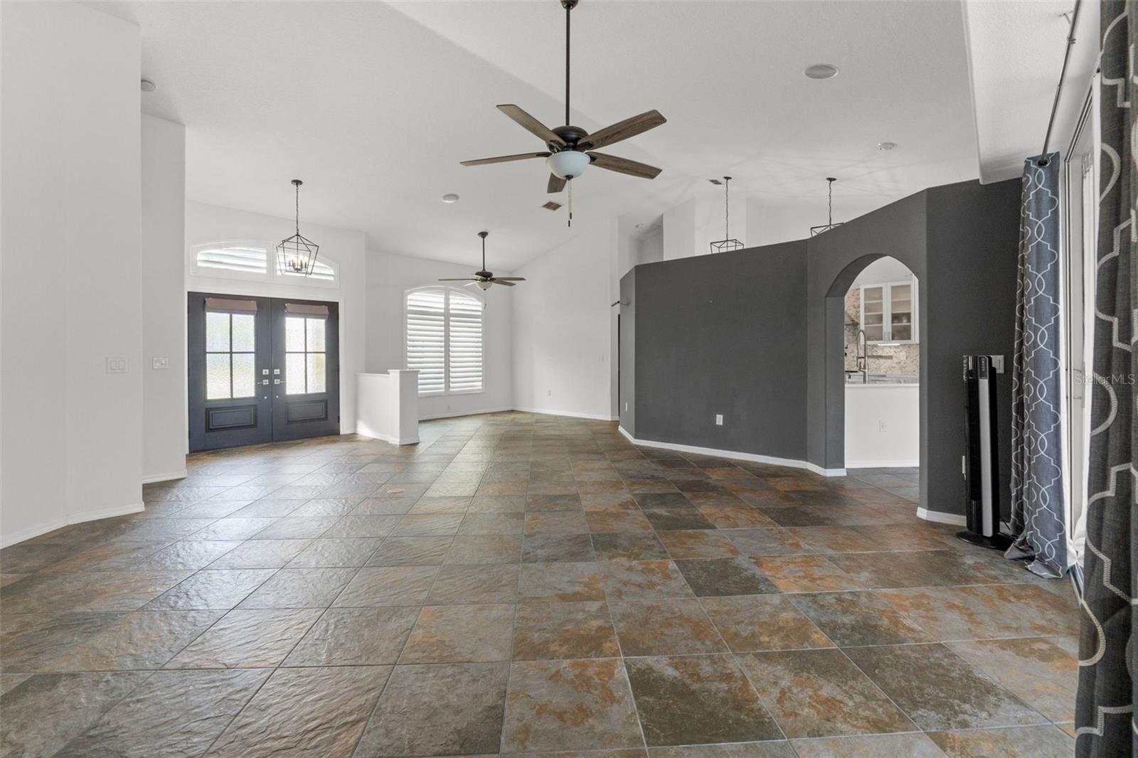 Expansive great room with tile flooring