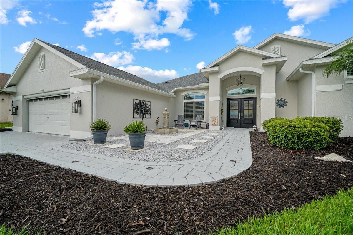 Double front columns frame the entry