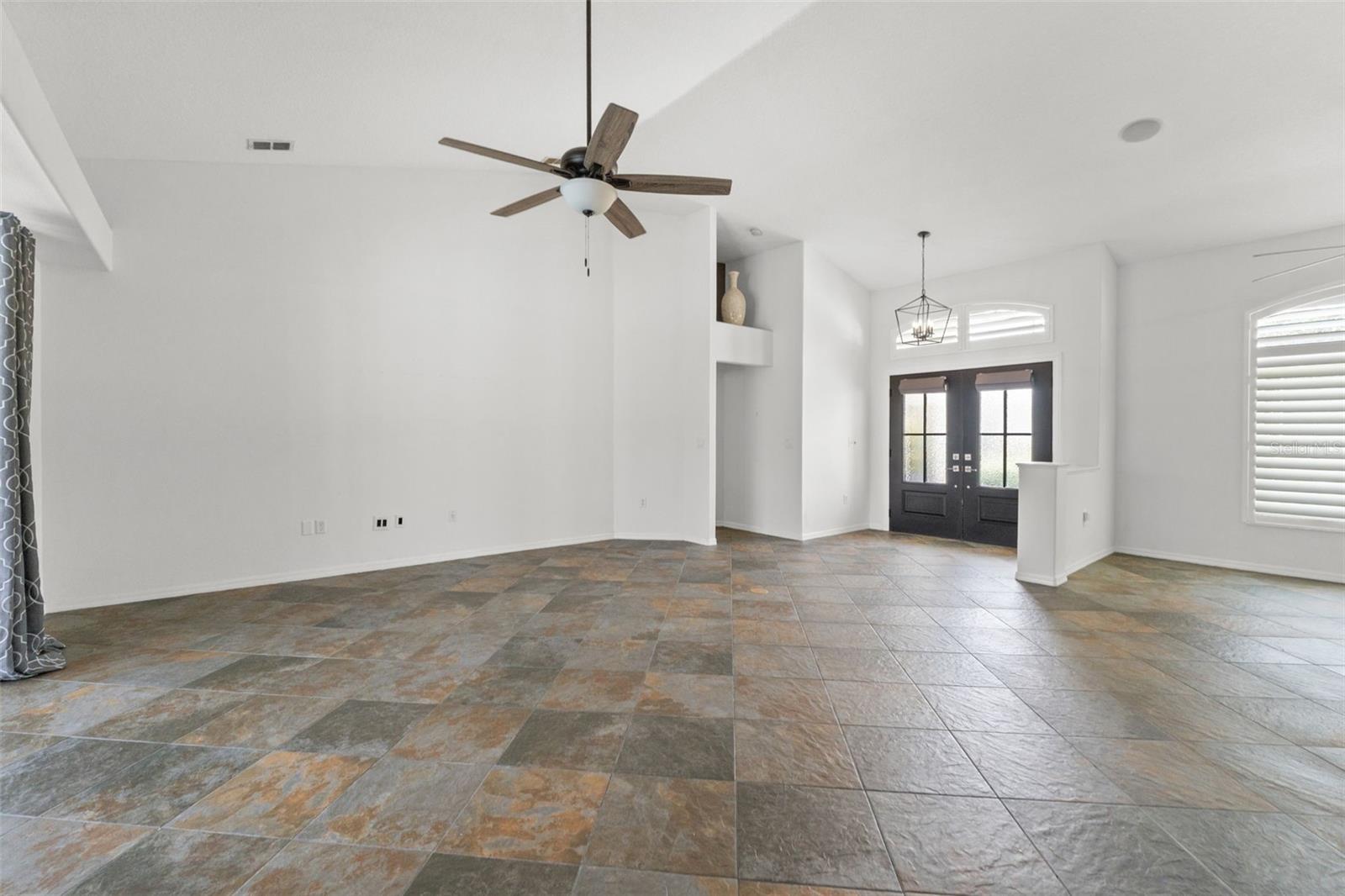 Expansive great room with tile flooring