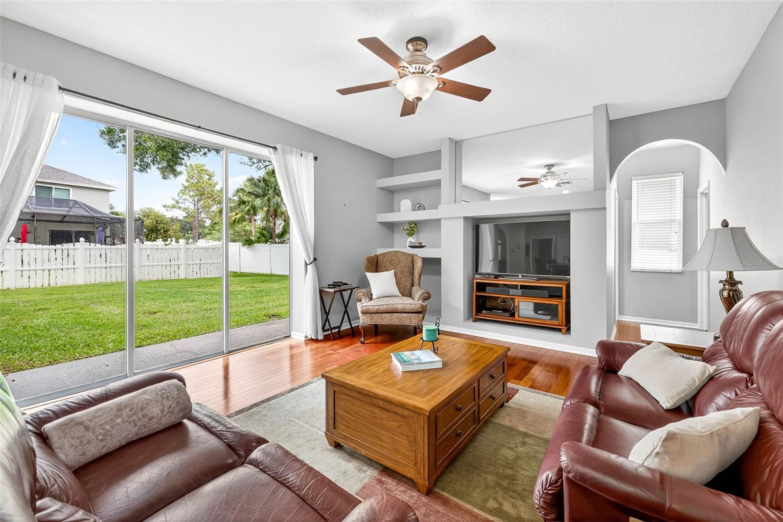 View of lush backyard from Family Room