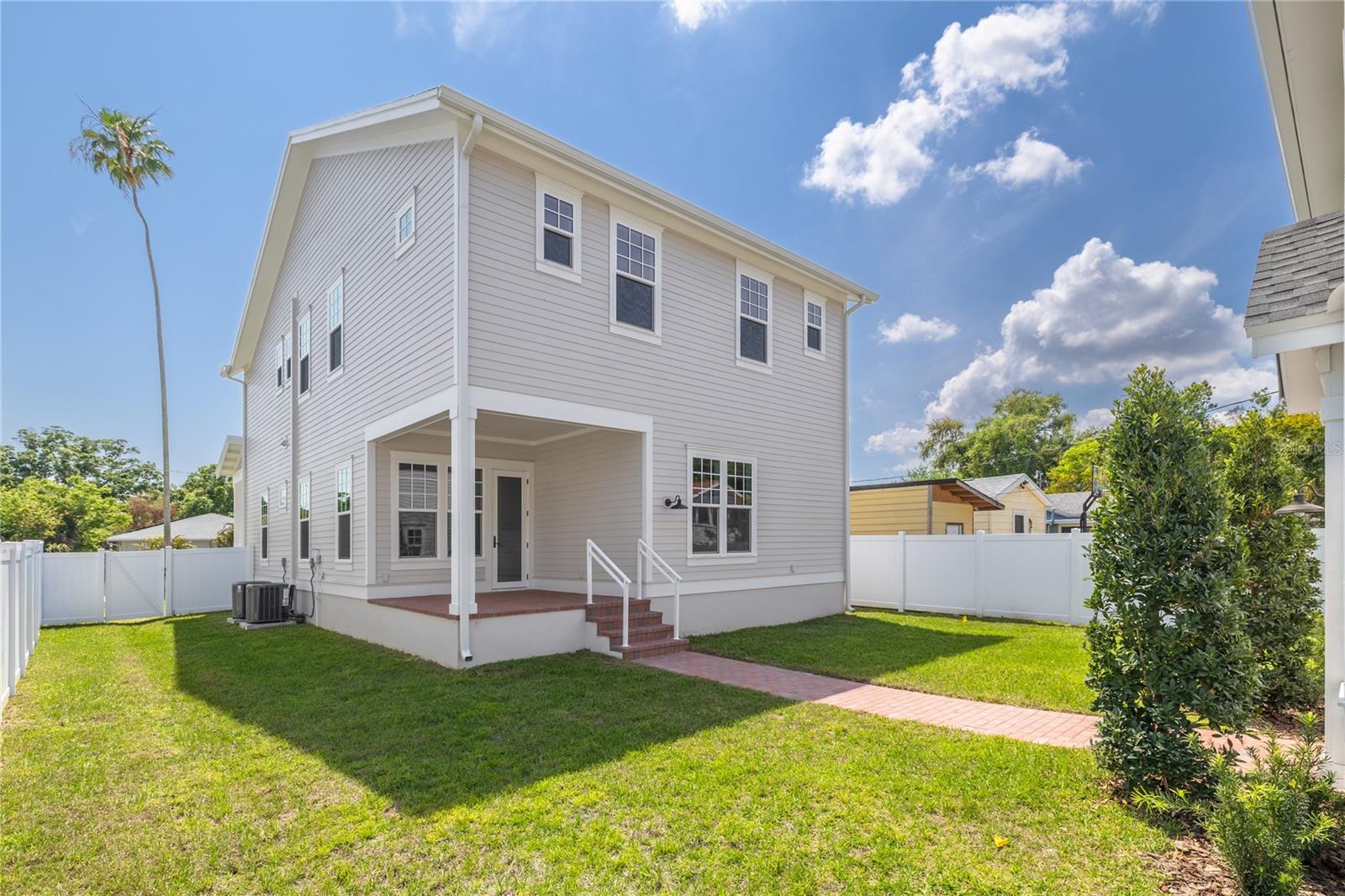 Backyard with Back Elevation of the Home