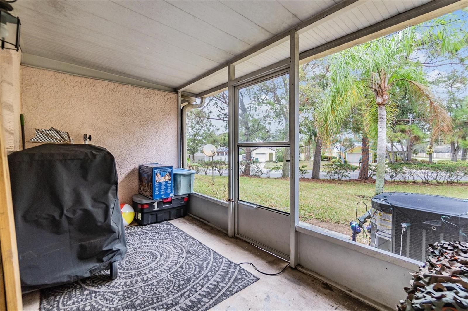 Screened-in lanai off Kitchen.