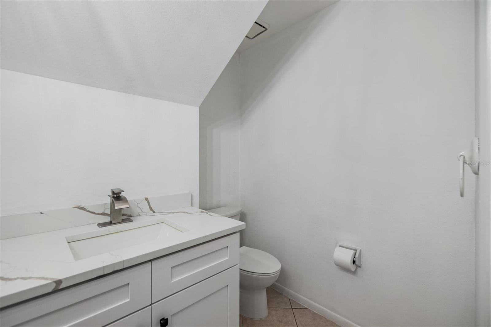 Downstairs updated half bath.