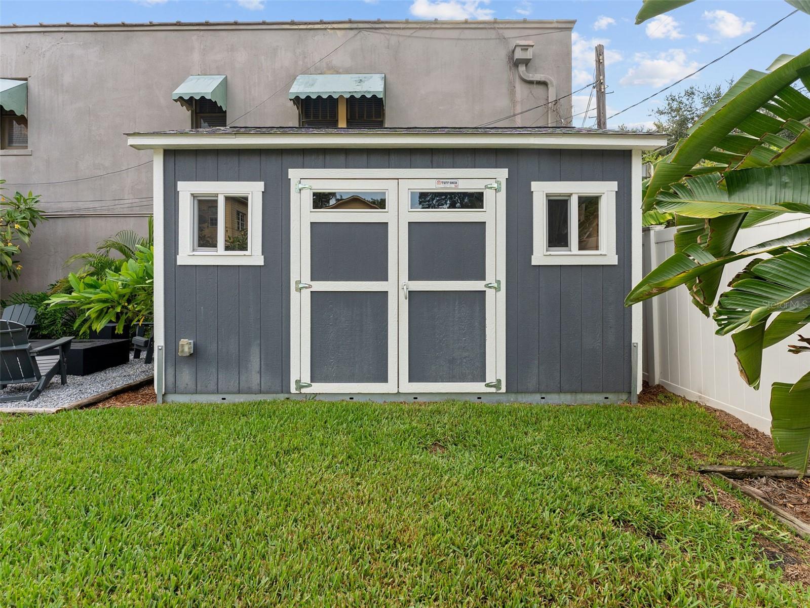 A backyard workshop with electrical. just add an AC