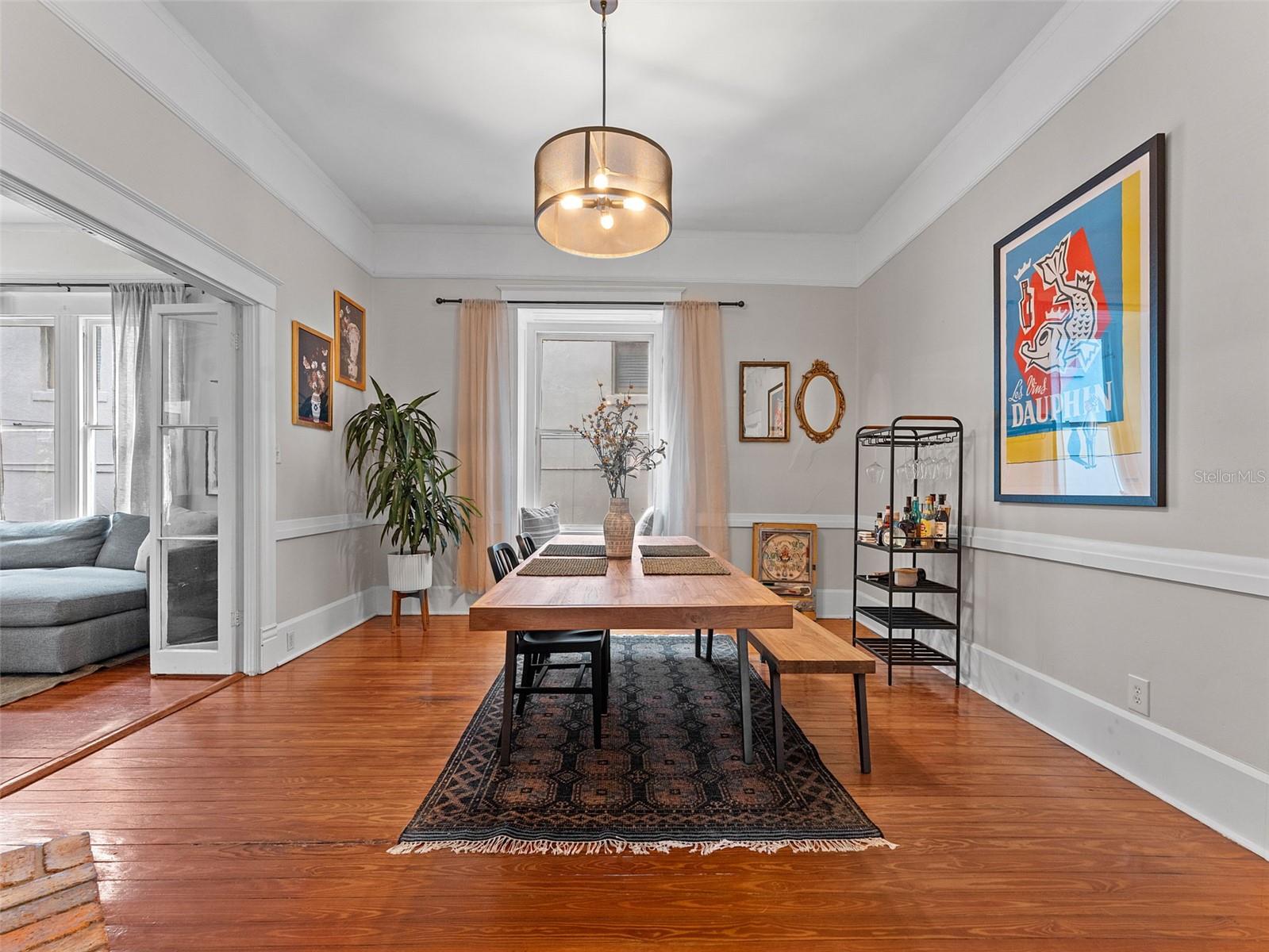 extra large dining room with high ceilings and 2nd fireplace.