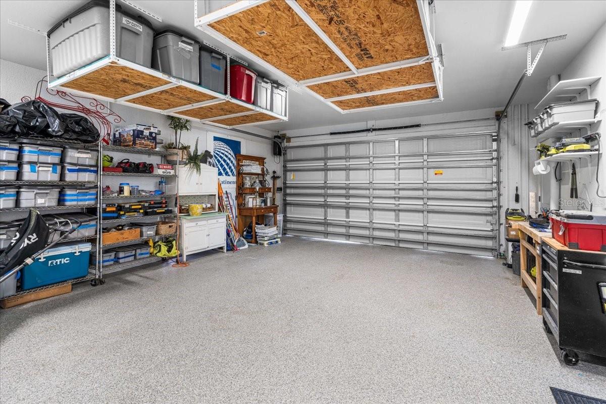 Garage: Hurricane door, ample storage, 2 car garage, entrance in rear from the alley.
