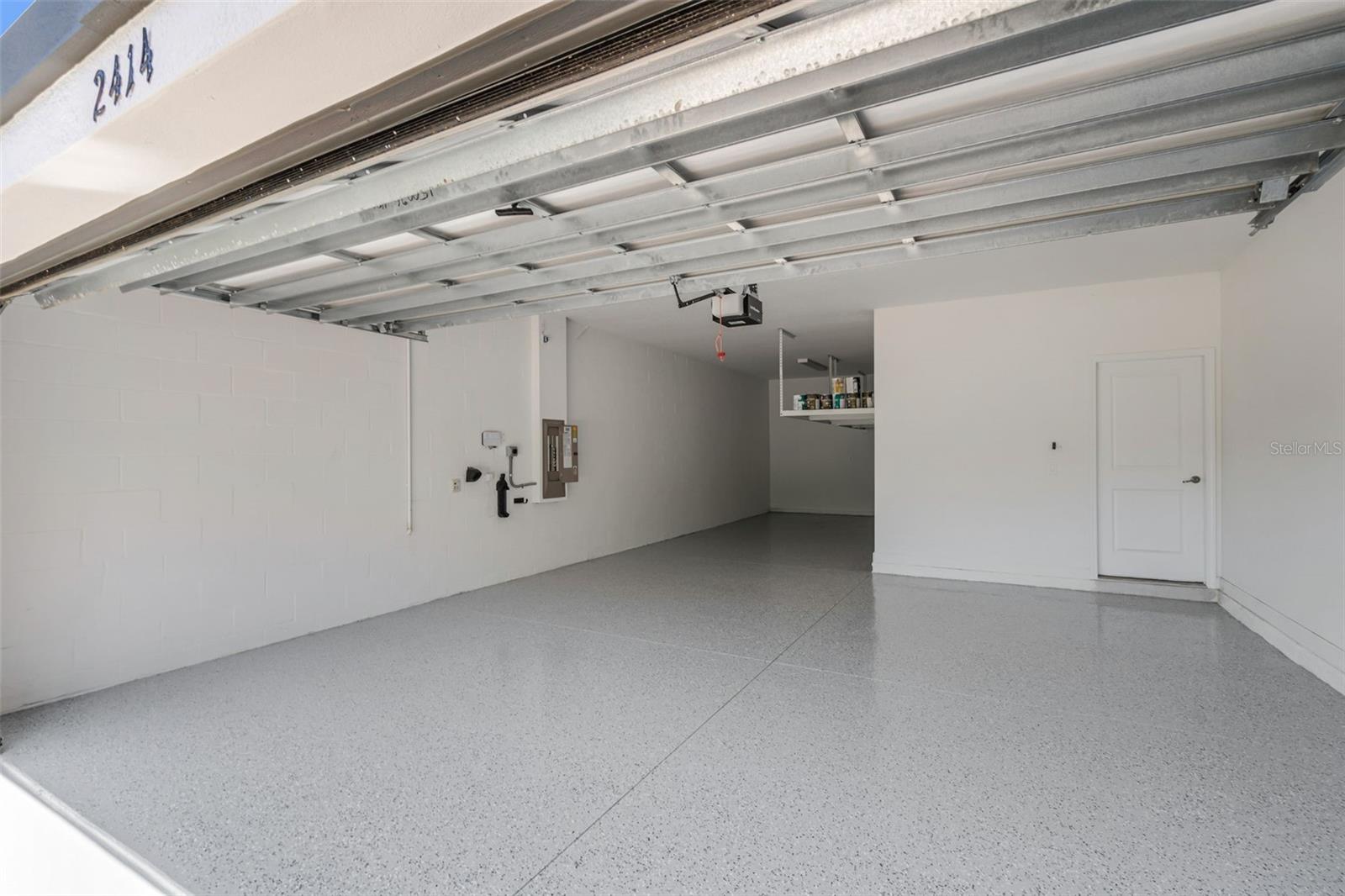 Tandum 3 car garage with epoxy floor