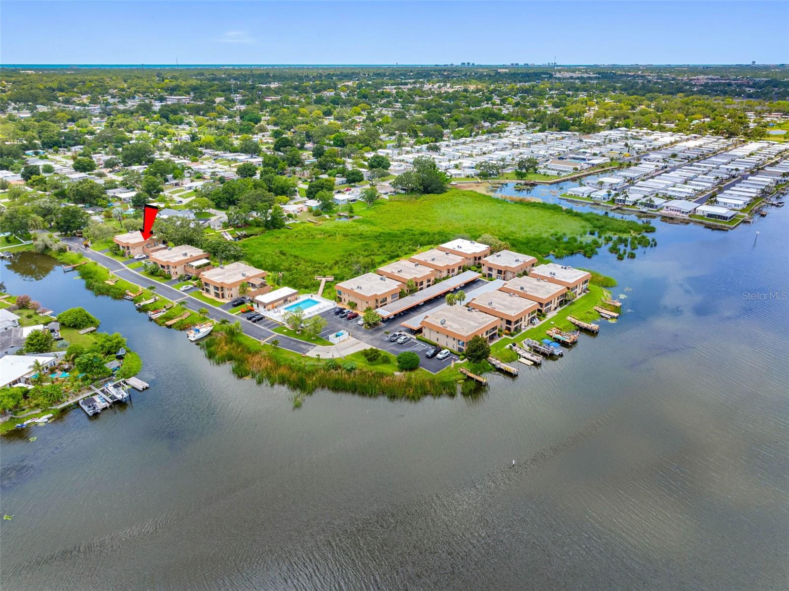 Private rooftop patio with sweeping lake views — a rare feature at this price