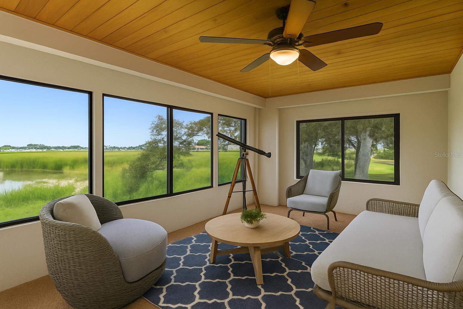 Kitchen with updated flooring and easy flow to outdoor living areas