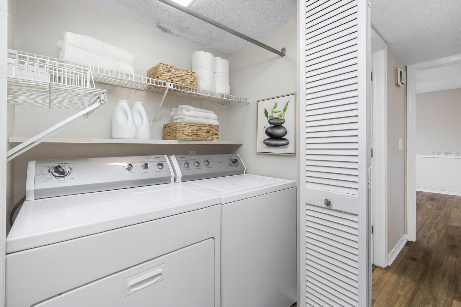Full-size washer and dryer conveniently located inside the unit