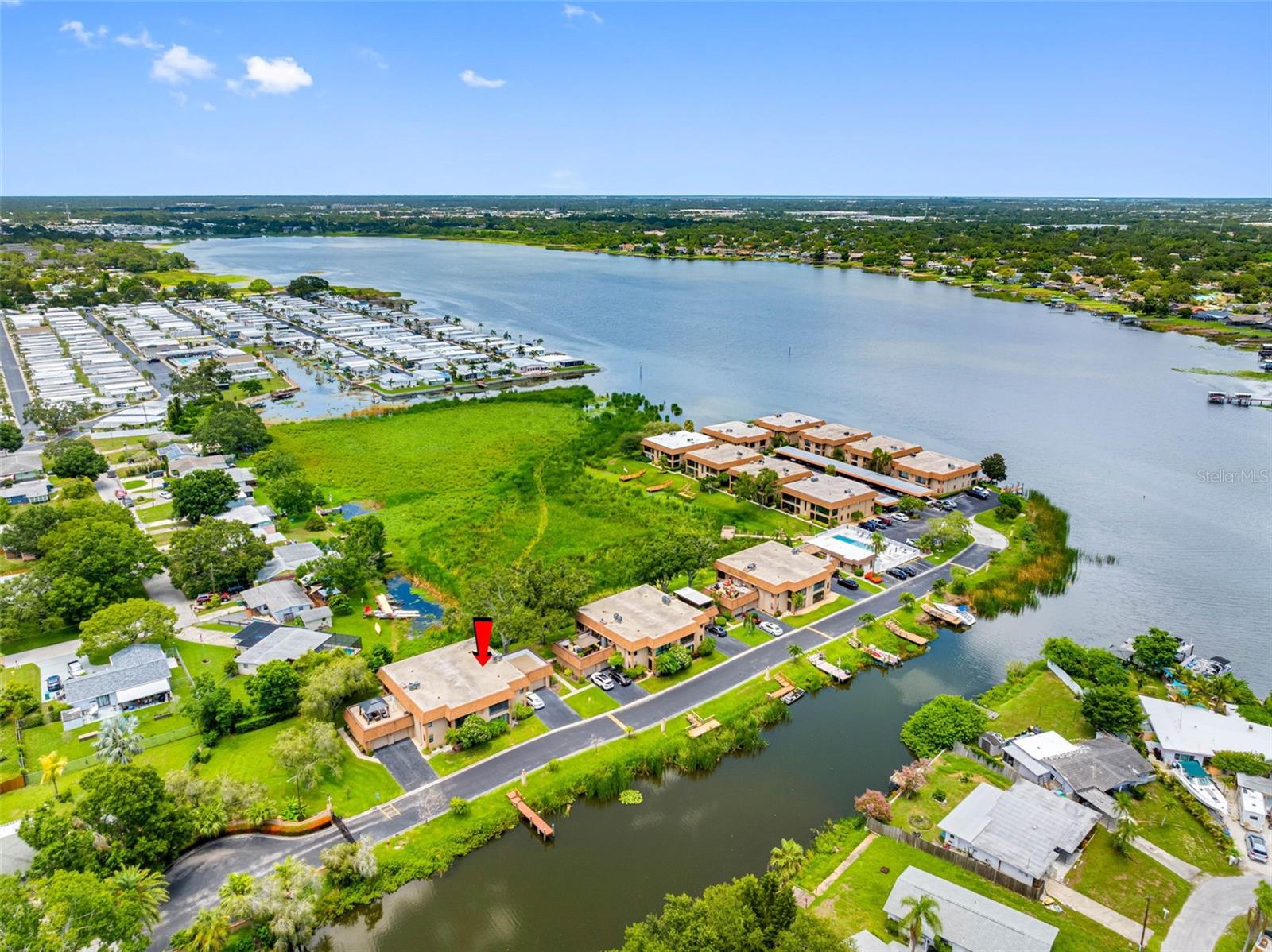 Gated, low-rise lakeside community with a long history of desirability