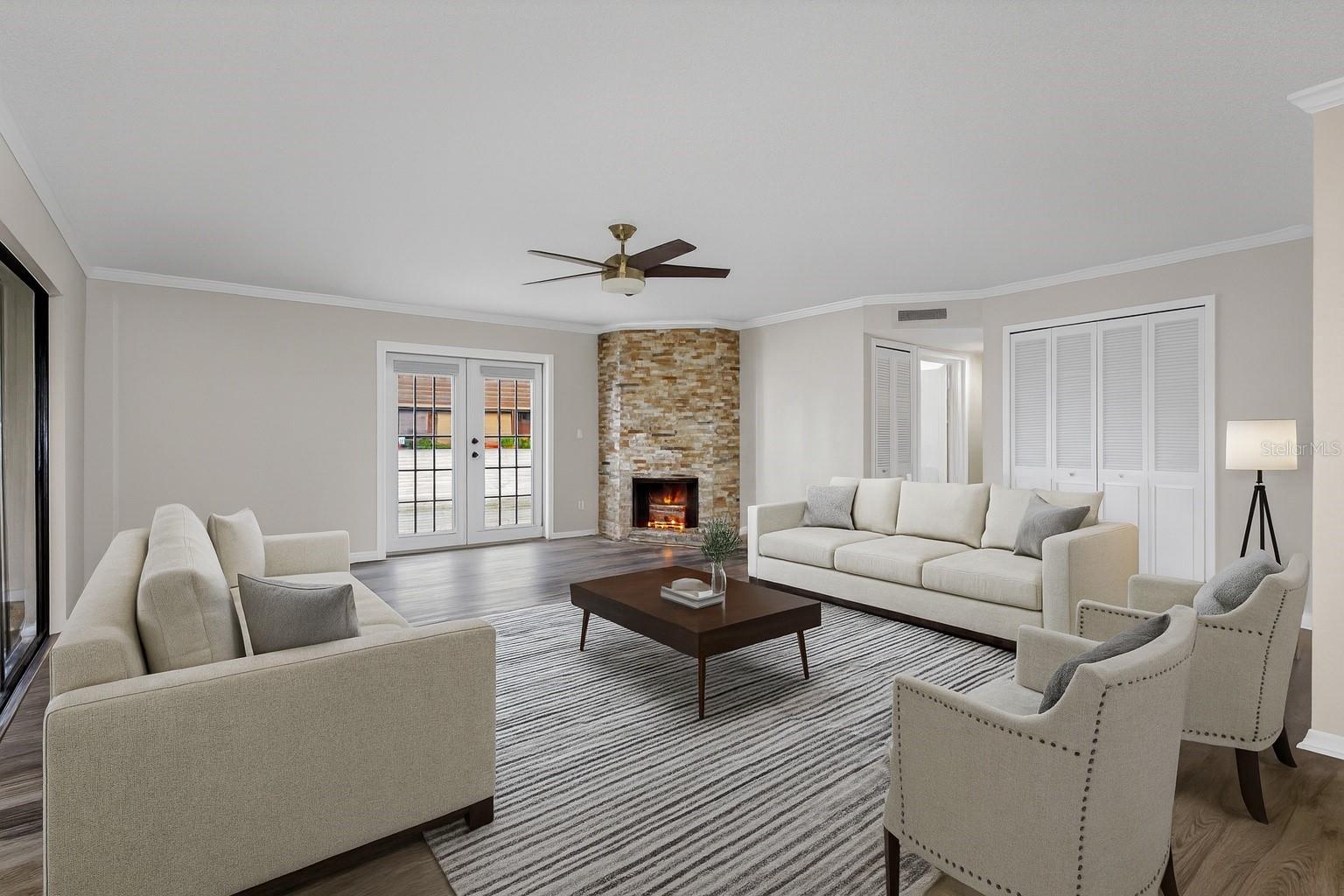 l Updated living area flooring and cozy fireplace with tranquil lake backdroppoint for everyday living