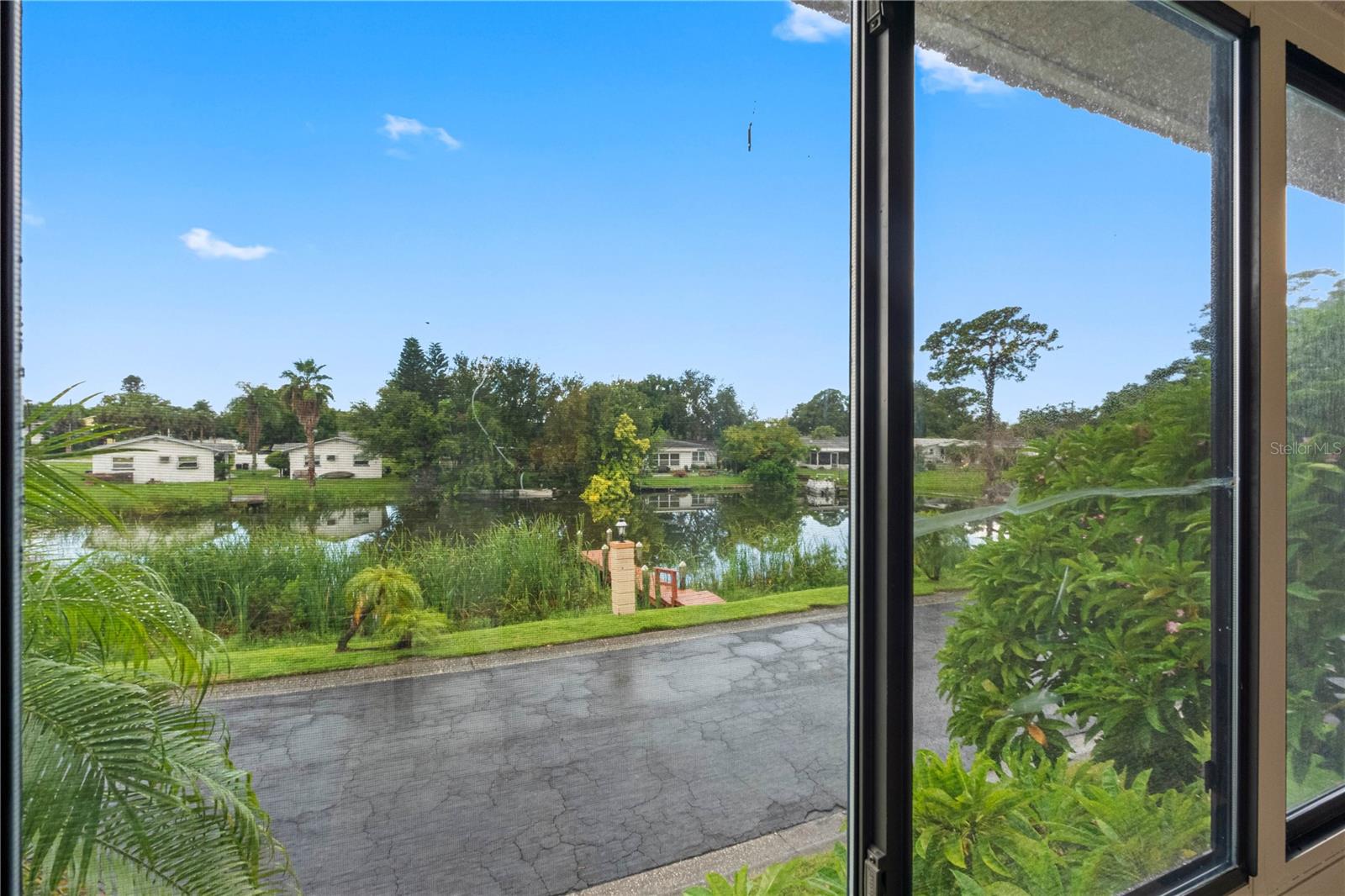 One of two additional private patios overlooking the lake