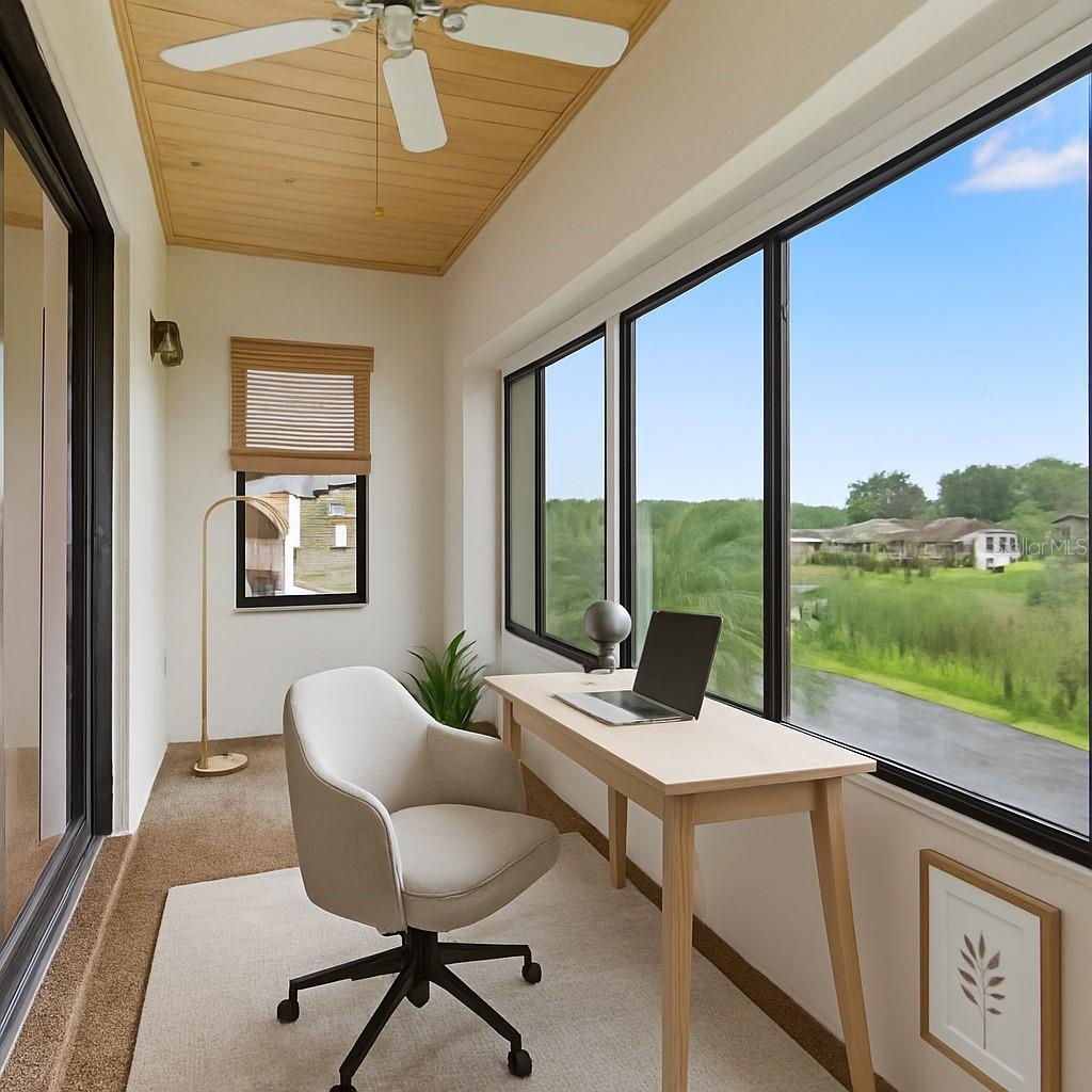 One of two additional private patios overlooking the lake