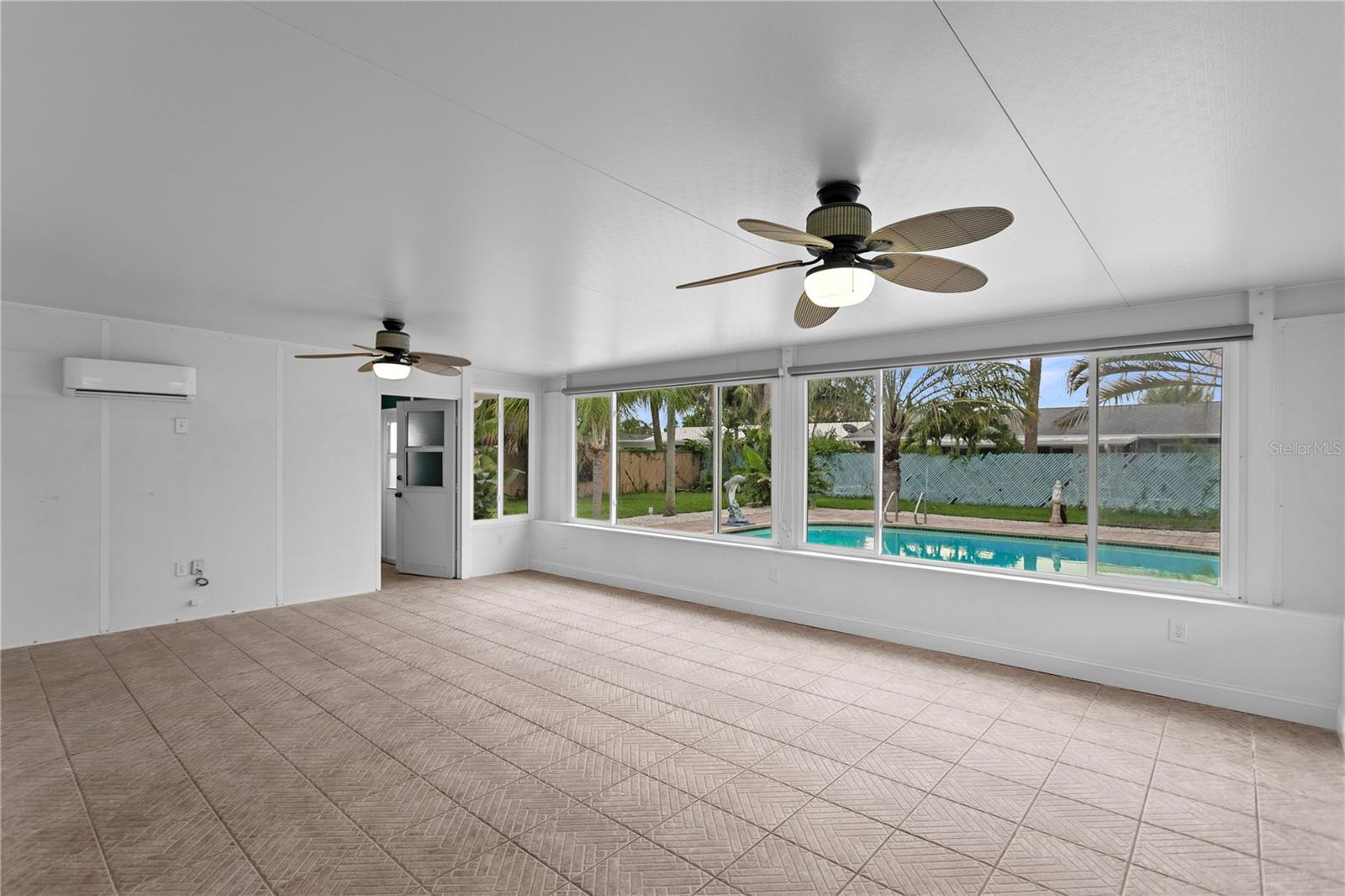 Florida Room facing pool and pool bathroom