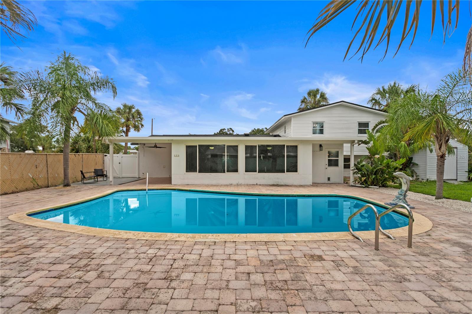 Backyard facing Florida room