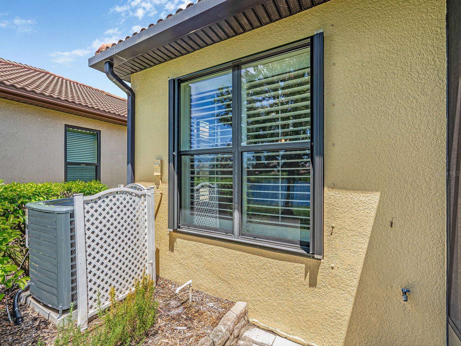 Hurricane Shutters on every window/Brand New AC