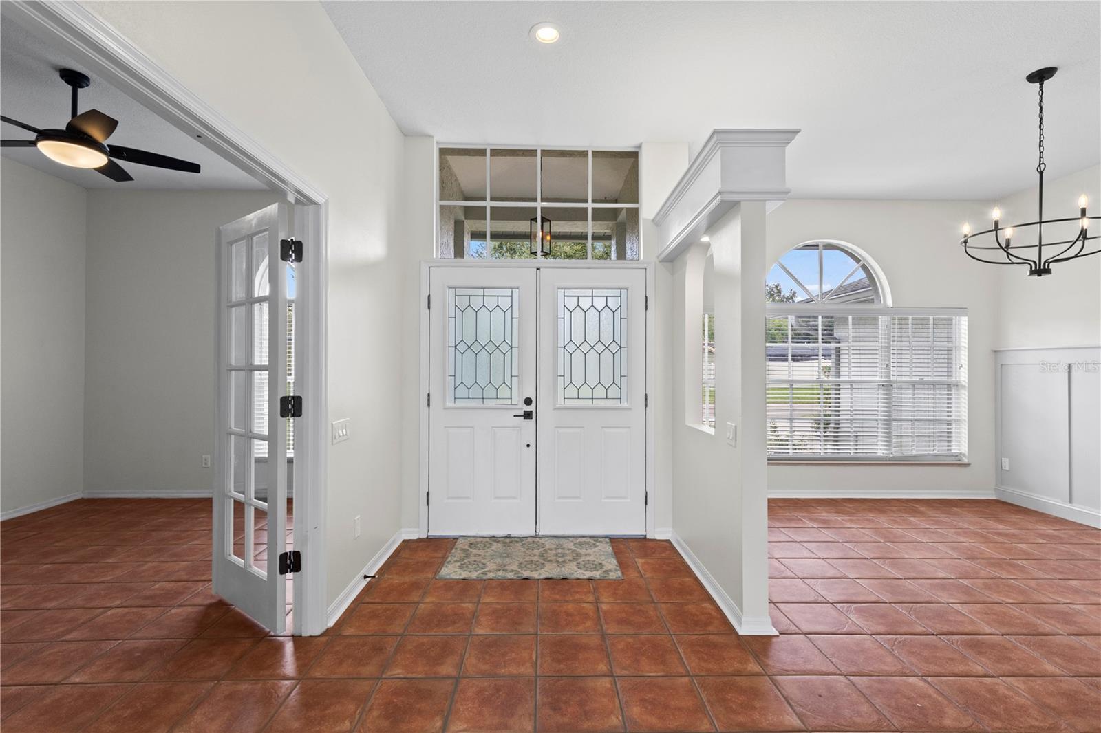 office on the right as you walk in and formal dining room on left