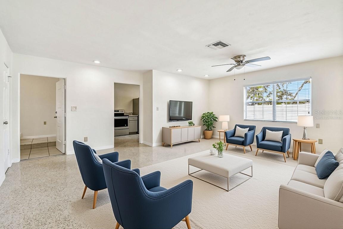 East Residence - Living and Florida Room Virtually Staged