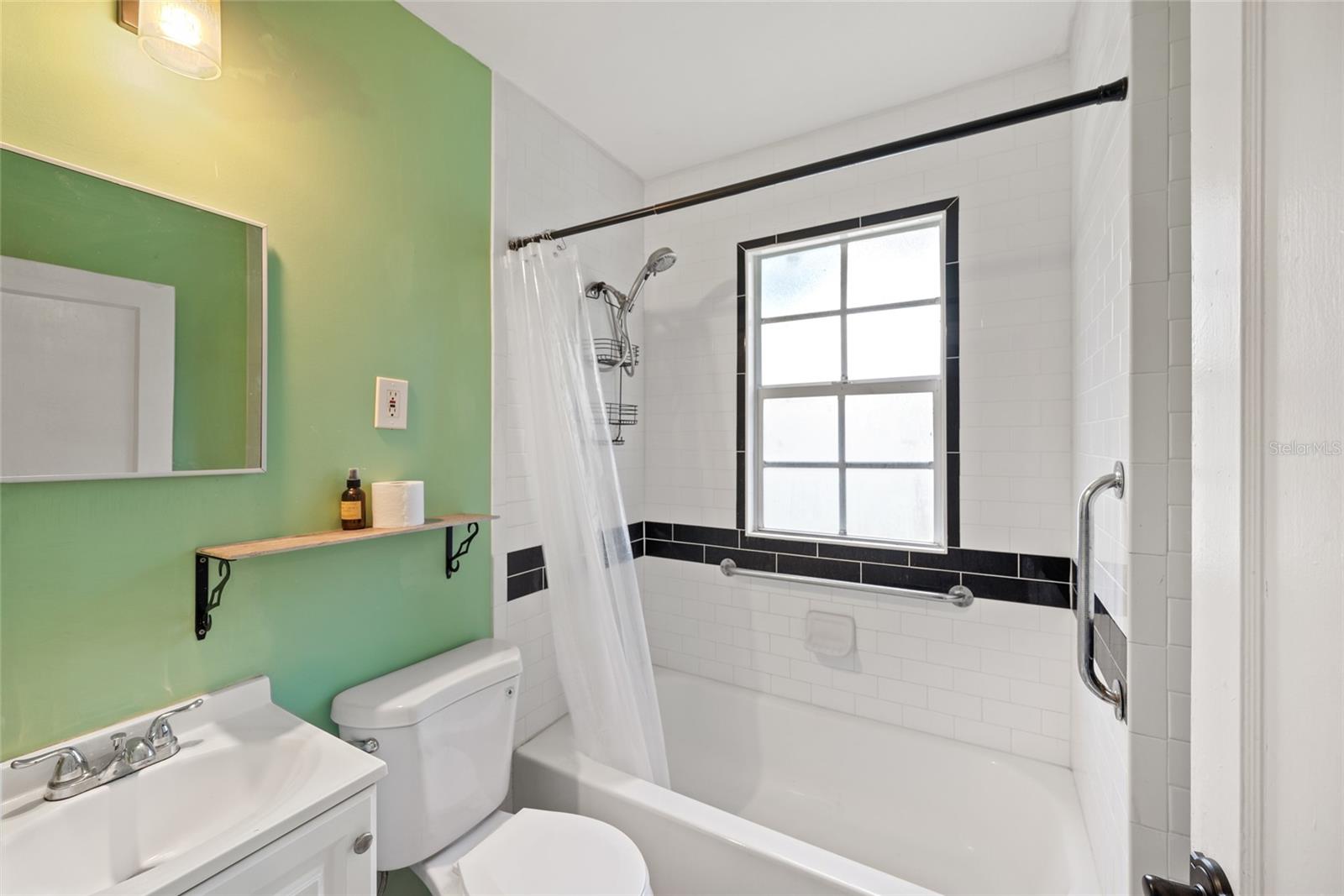 More black and white tile in the bathroom