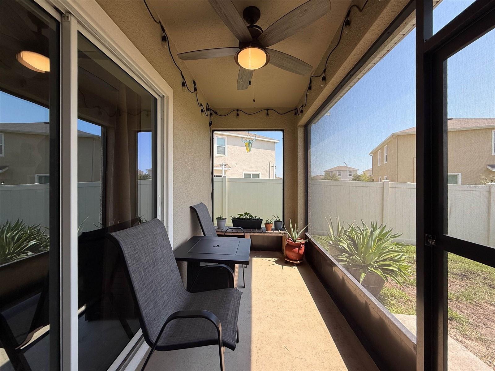 SCREENED IN PATIO WITH DOOR TO BACKYARD