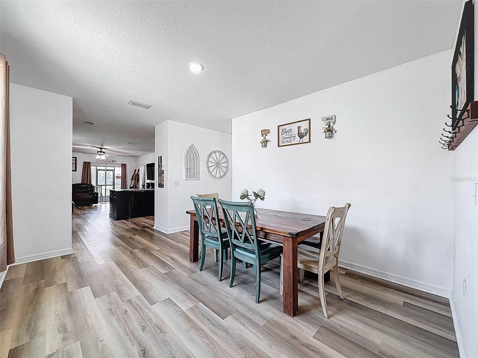 FOLLOW TO THE MAIN LIVING AREA WITH KITCHEN AND FAMILY ROOM