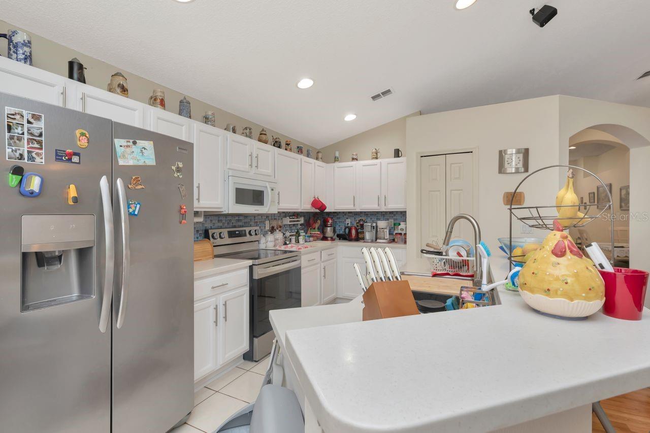 Kitchen with counter bar.