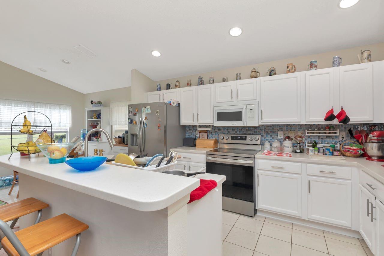 Kitchen with stainless steel appliances.