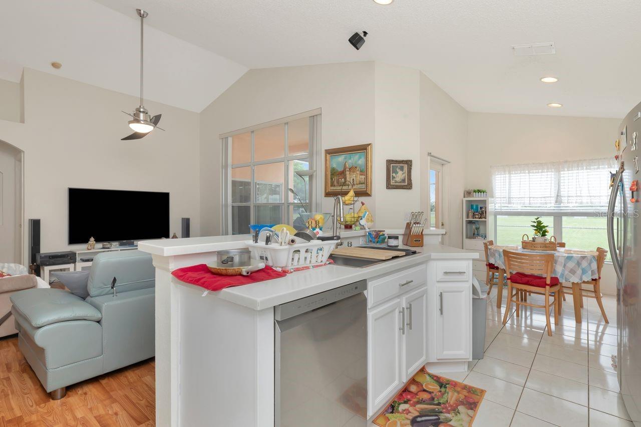 Kitchen, breakfast nook family room combo.