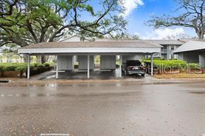 Covered Parking Space with Storage Unit