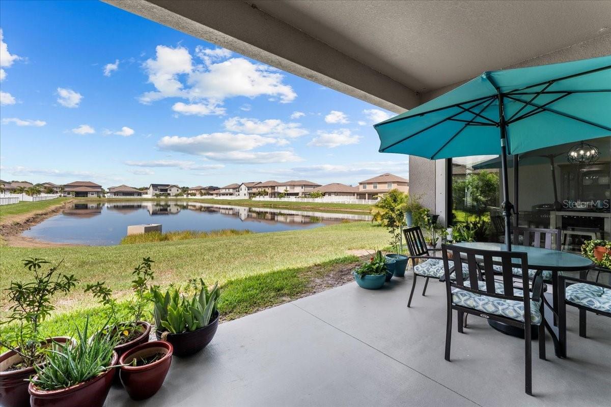 Covered patio overlooking pond
