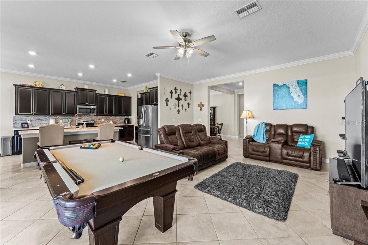 Pool table included, but if you want/need larger living area....there is plenty of space for you to grow!