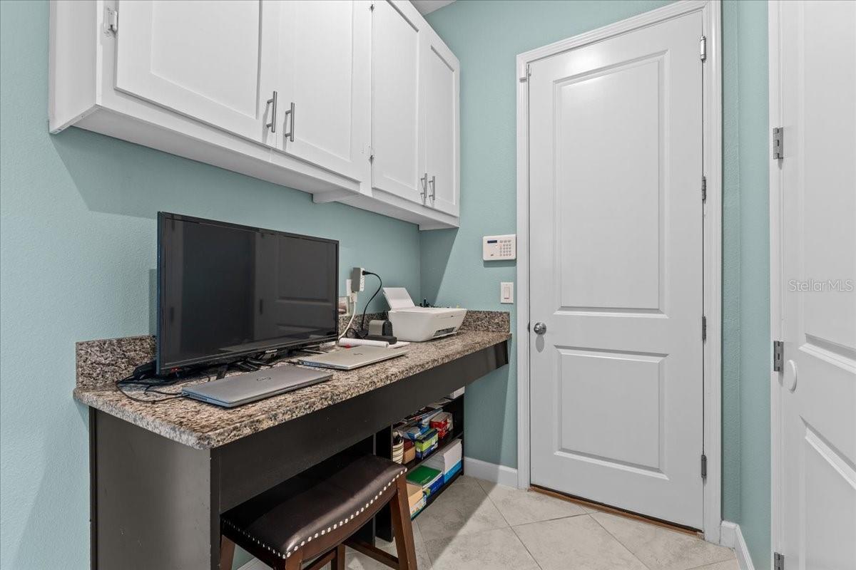 Flex area with storage cabinets. Office space, craft/hobby room