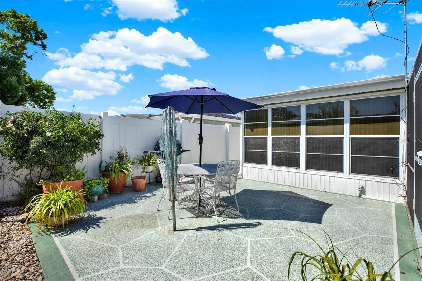 Patio area for relaxing, gardening and bbqs.