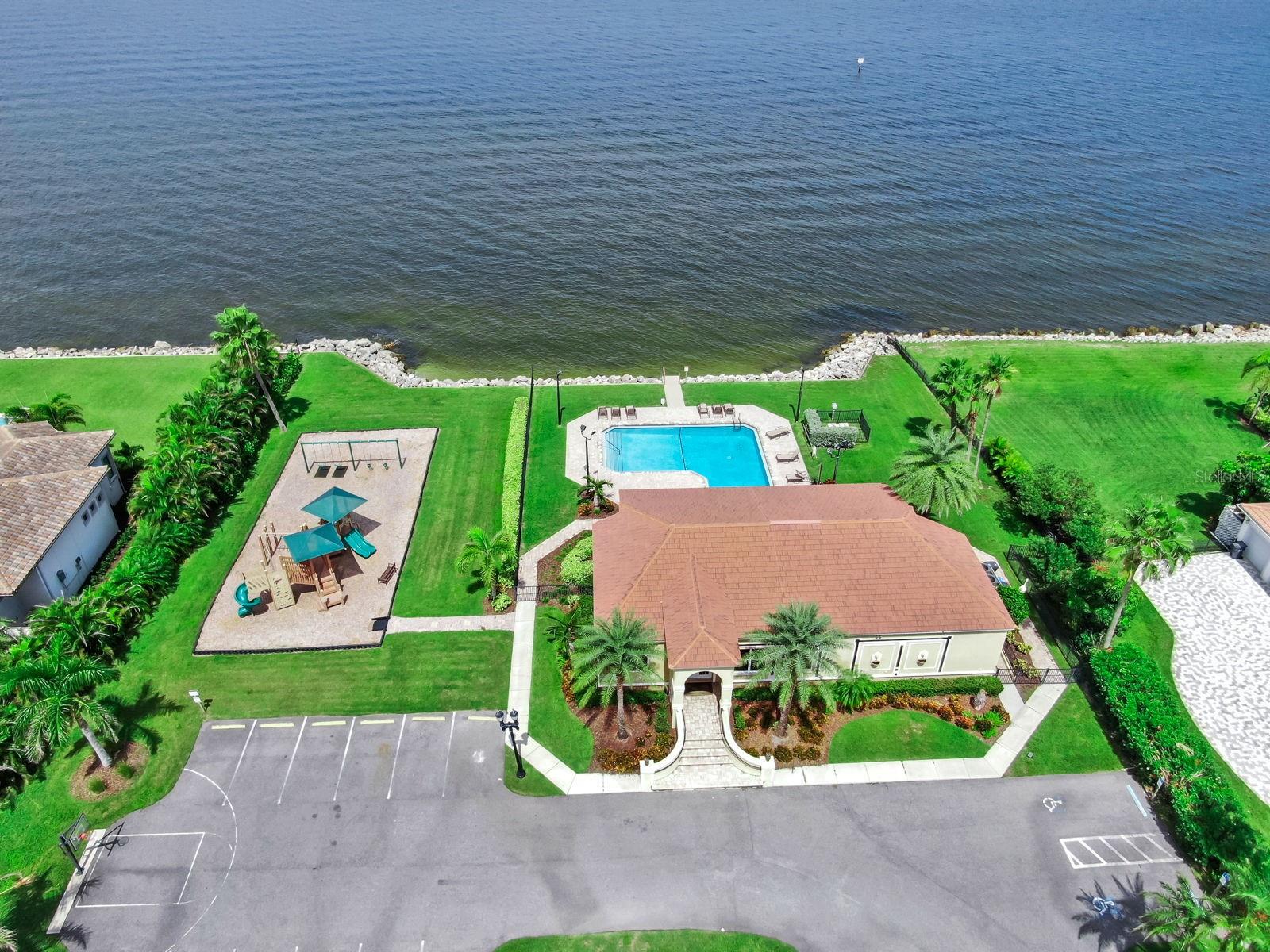 Clubhouse and pool on the bay