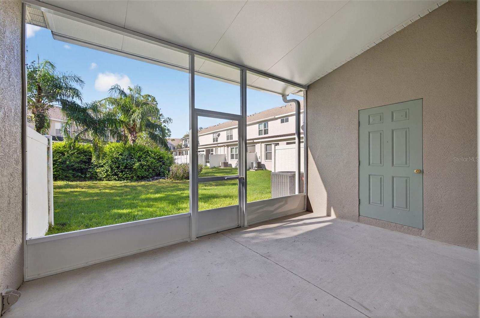 Screened and Covered Rear Patio with Oversized Storage Closet