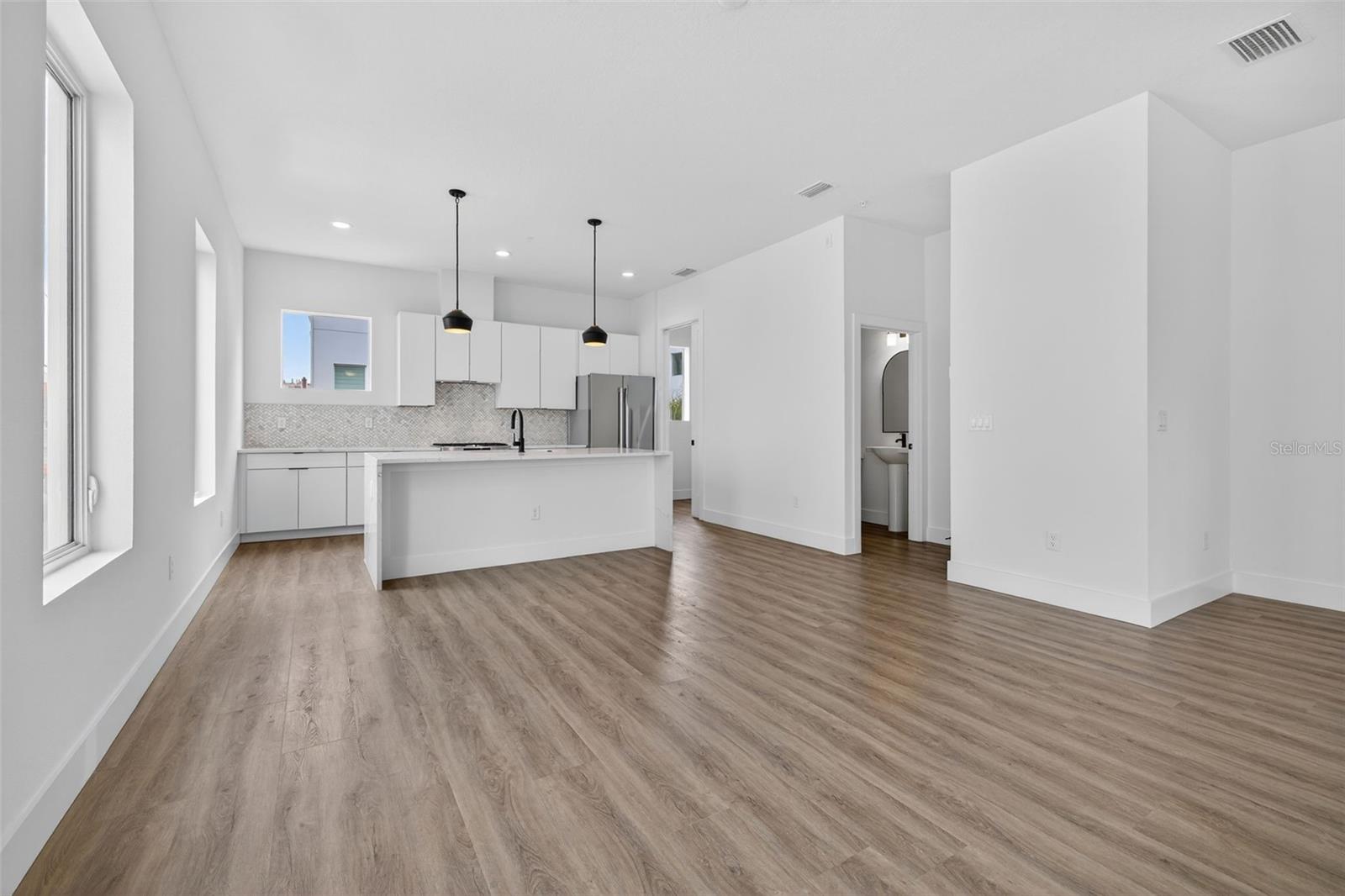 Beautiful Modern Kitchen with open dining and living room