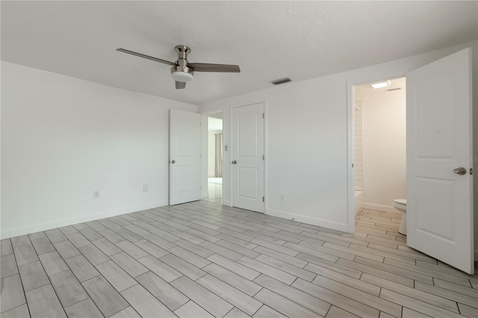 Primary bedroom has walk-in closet.