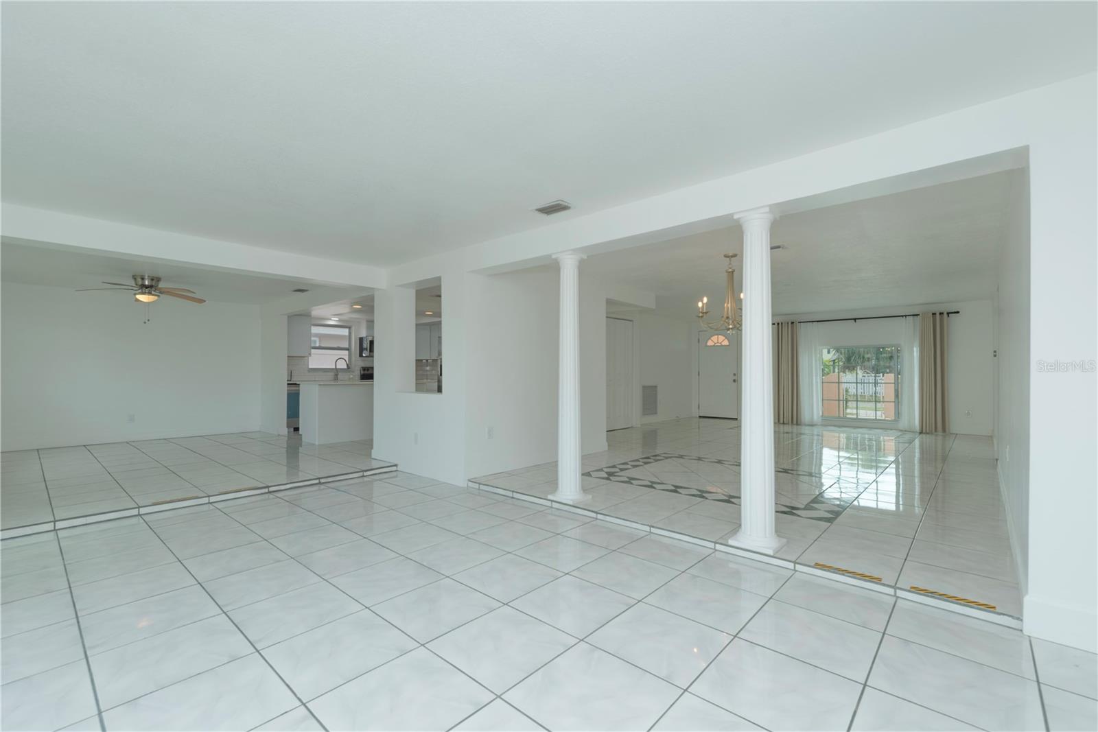 Family room looking into dining and living room.