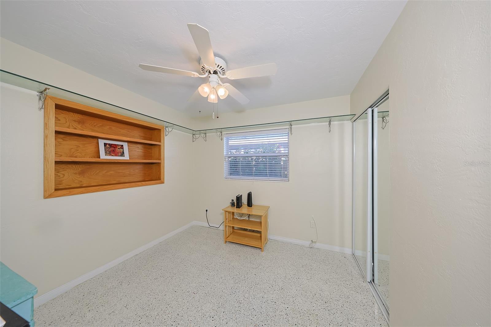 2nd bedroom with built-in shelves