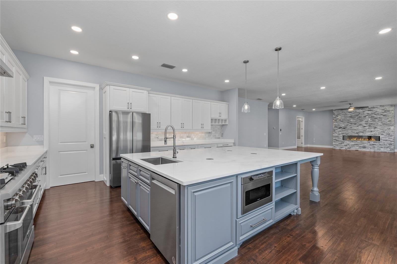 The Island of your dreams.  This versatile space has room for dining, prepping and clean up.