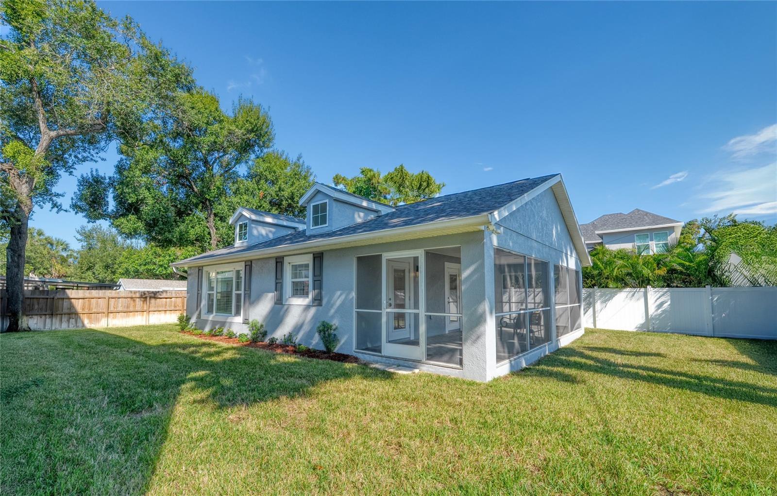 This 2 bedroom, 1 bathroom home has an open floorplan with a large screened lanai