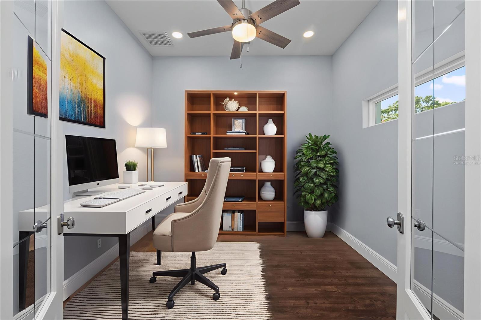 Virtually staged Private office with French doors on the first floor