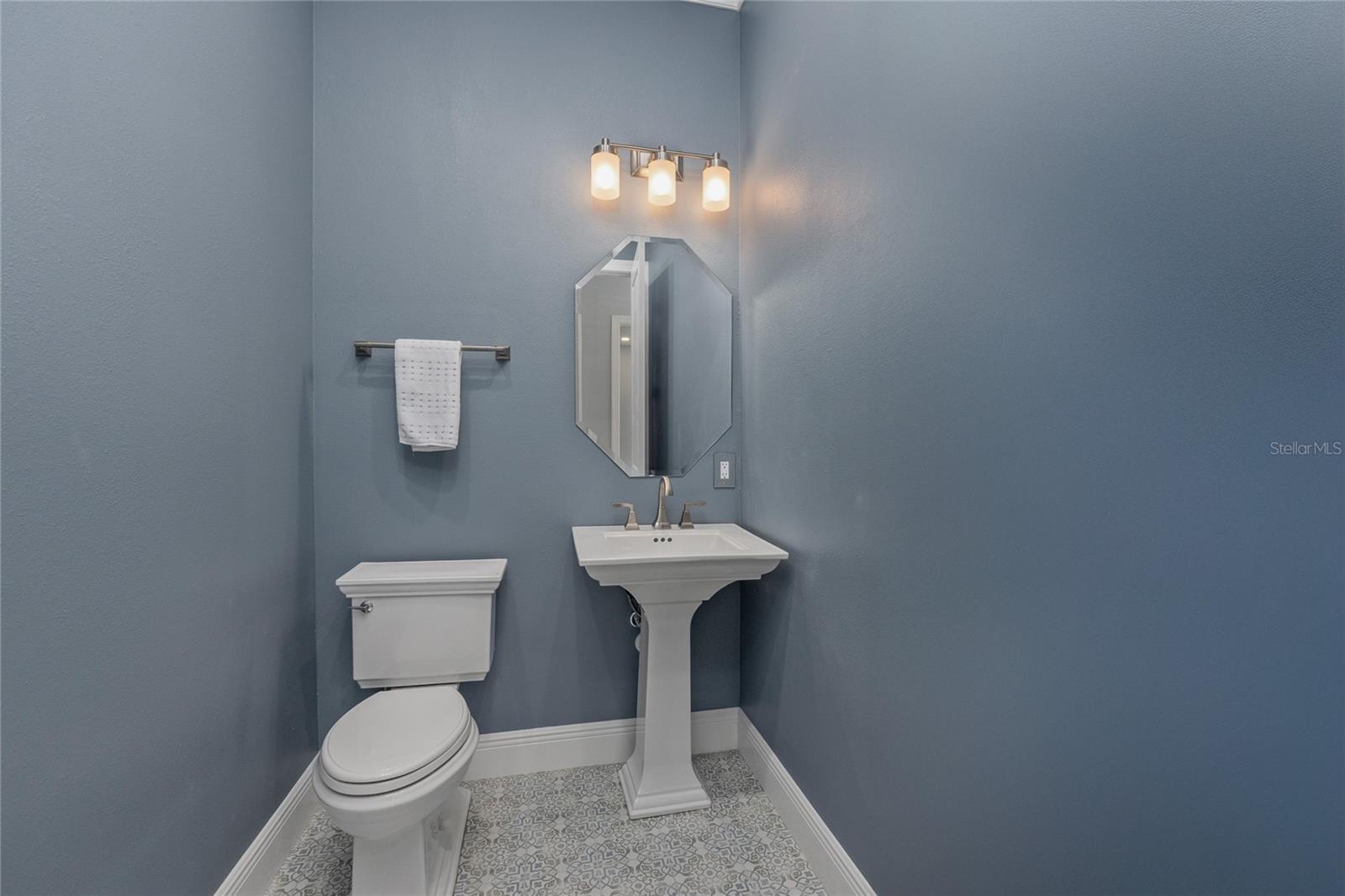 Powder room on 1st floor, perfect for guests
