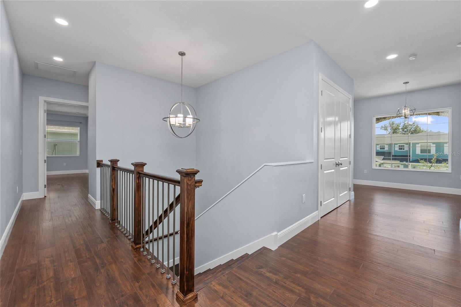 The 2nd floor landing has a sunny space in front of this window