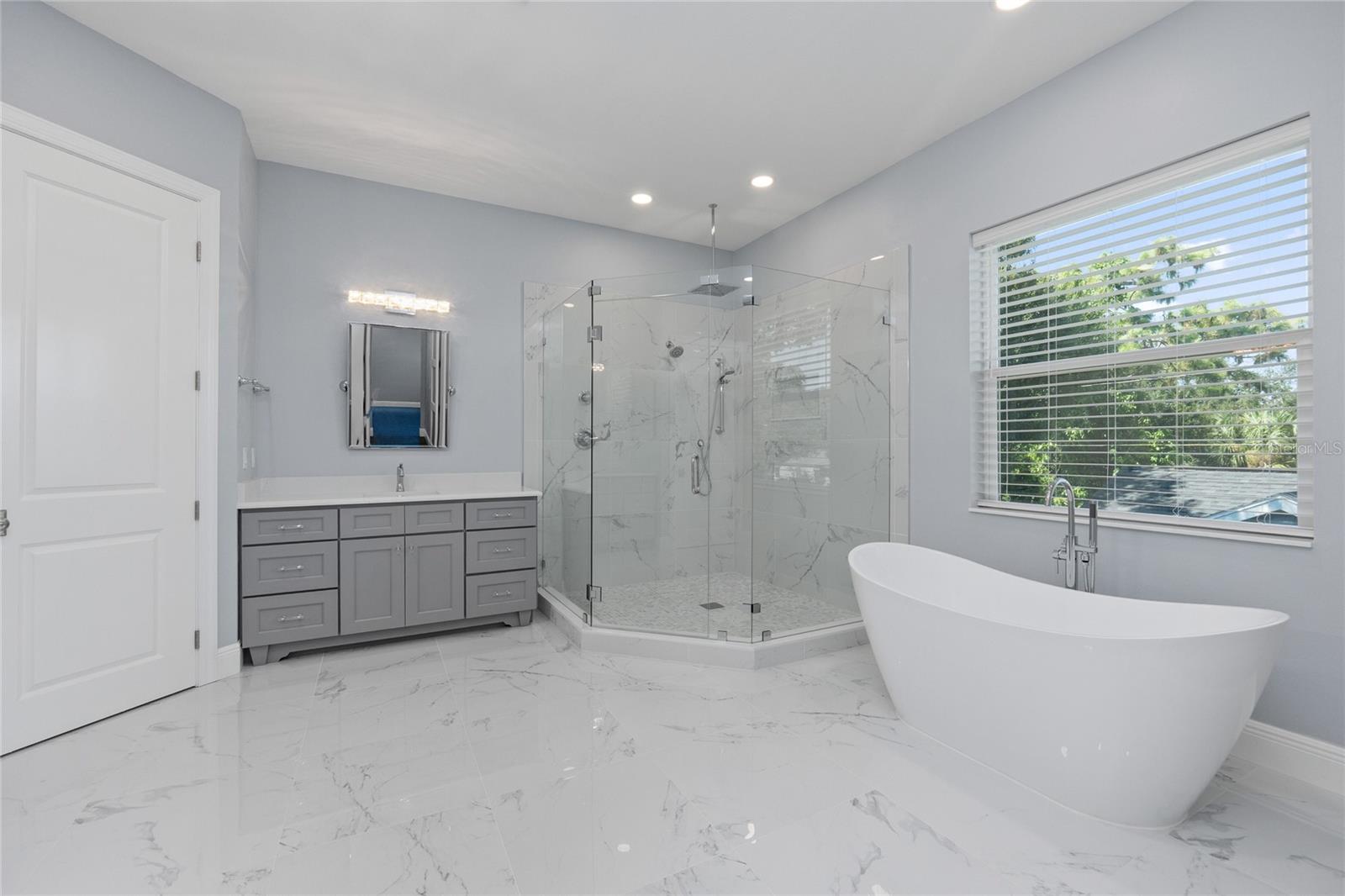 The Primary Bathroom is a spa like retreat