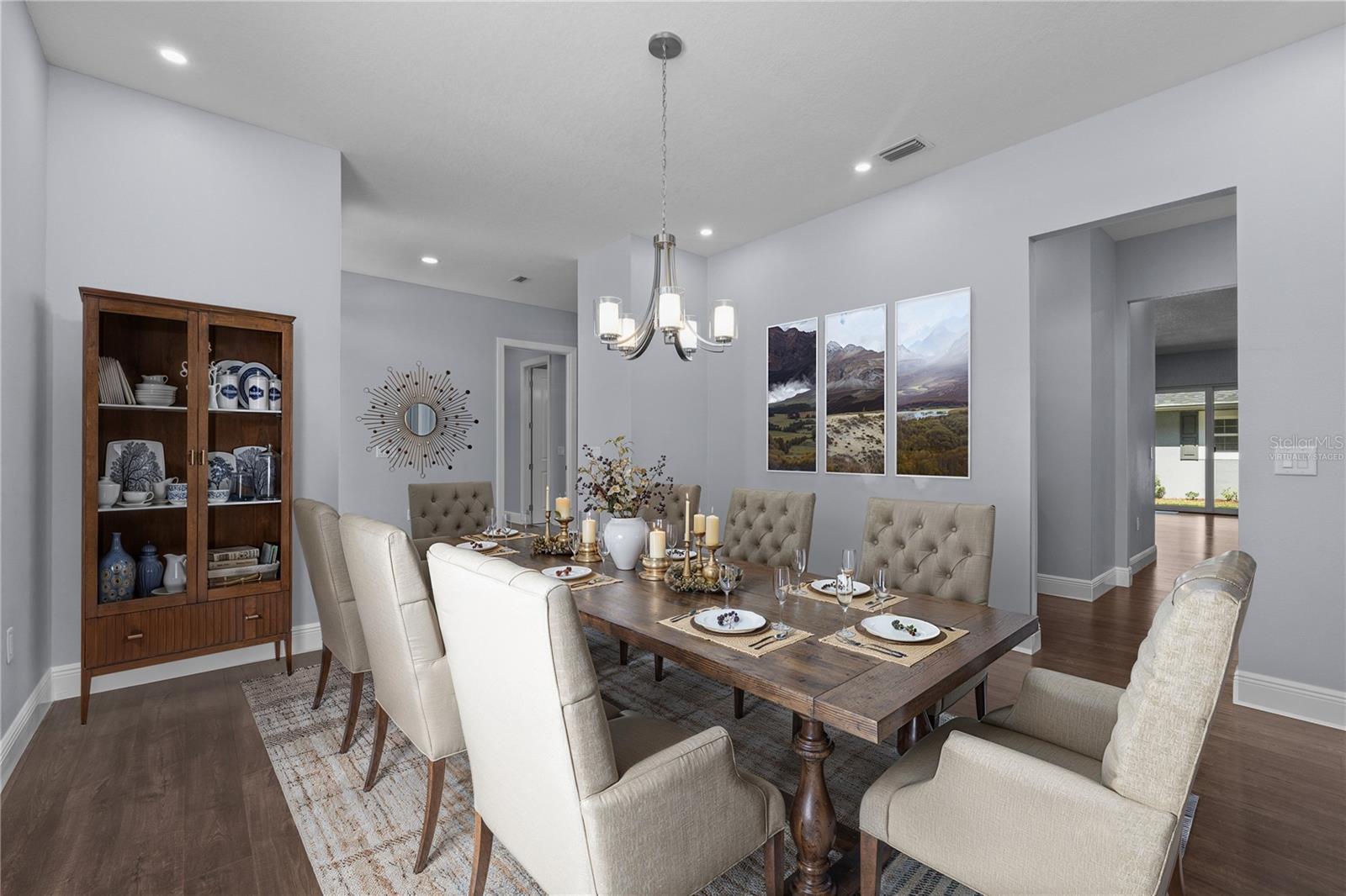 Virtually staged Spacious Dining Room with Butler's Pantry