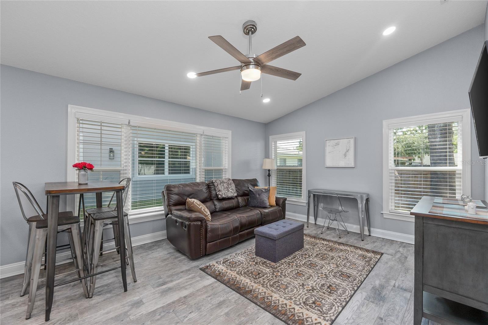 This home is move in ready with tile flooring, fresh paint, and window treatments