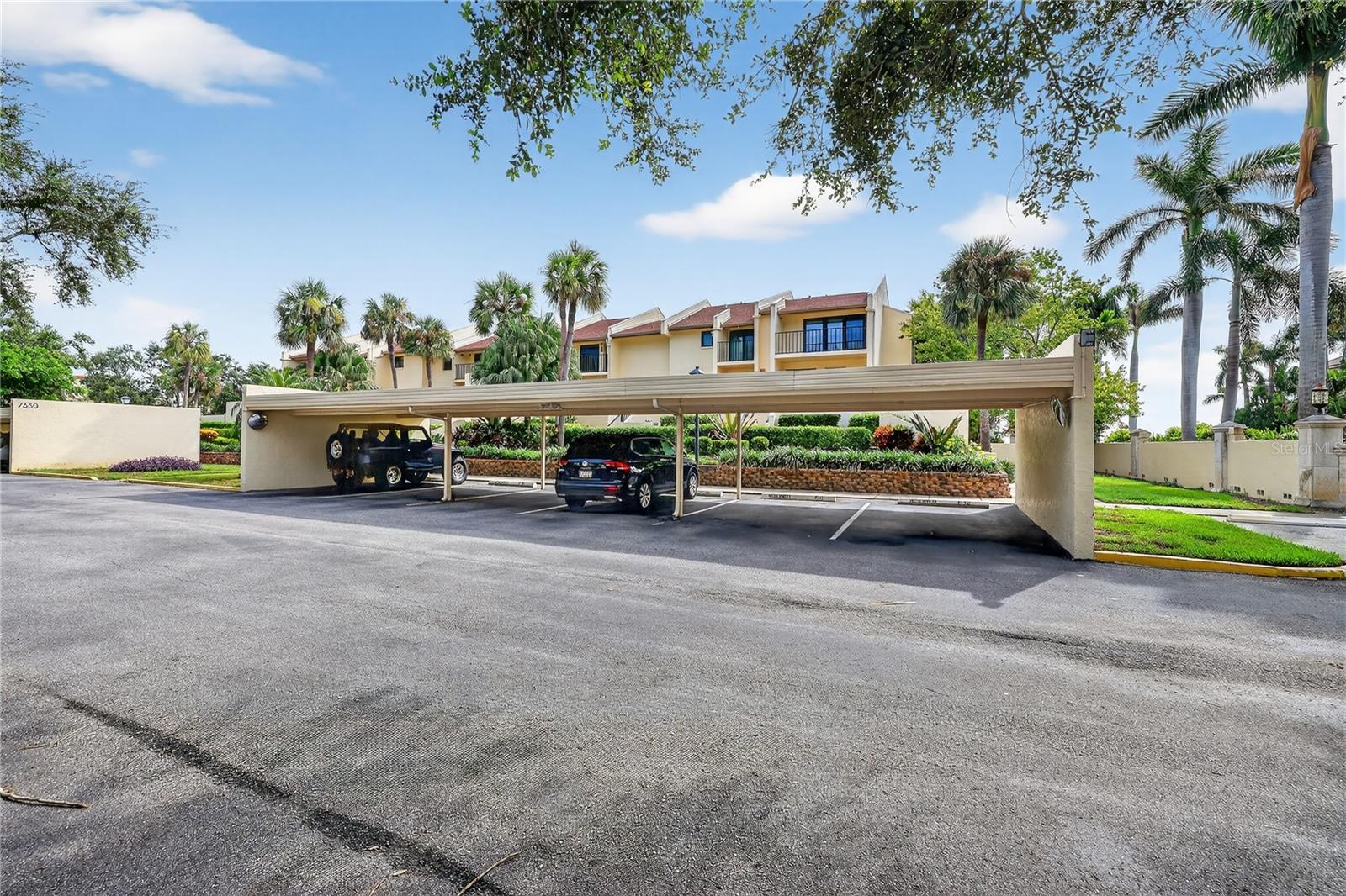 Your private, covered parking space! (Far right next to wall)