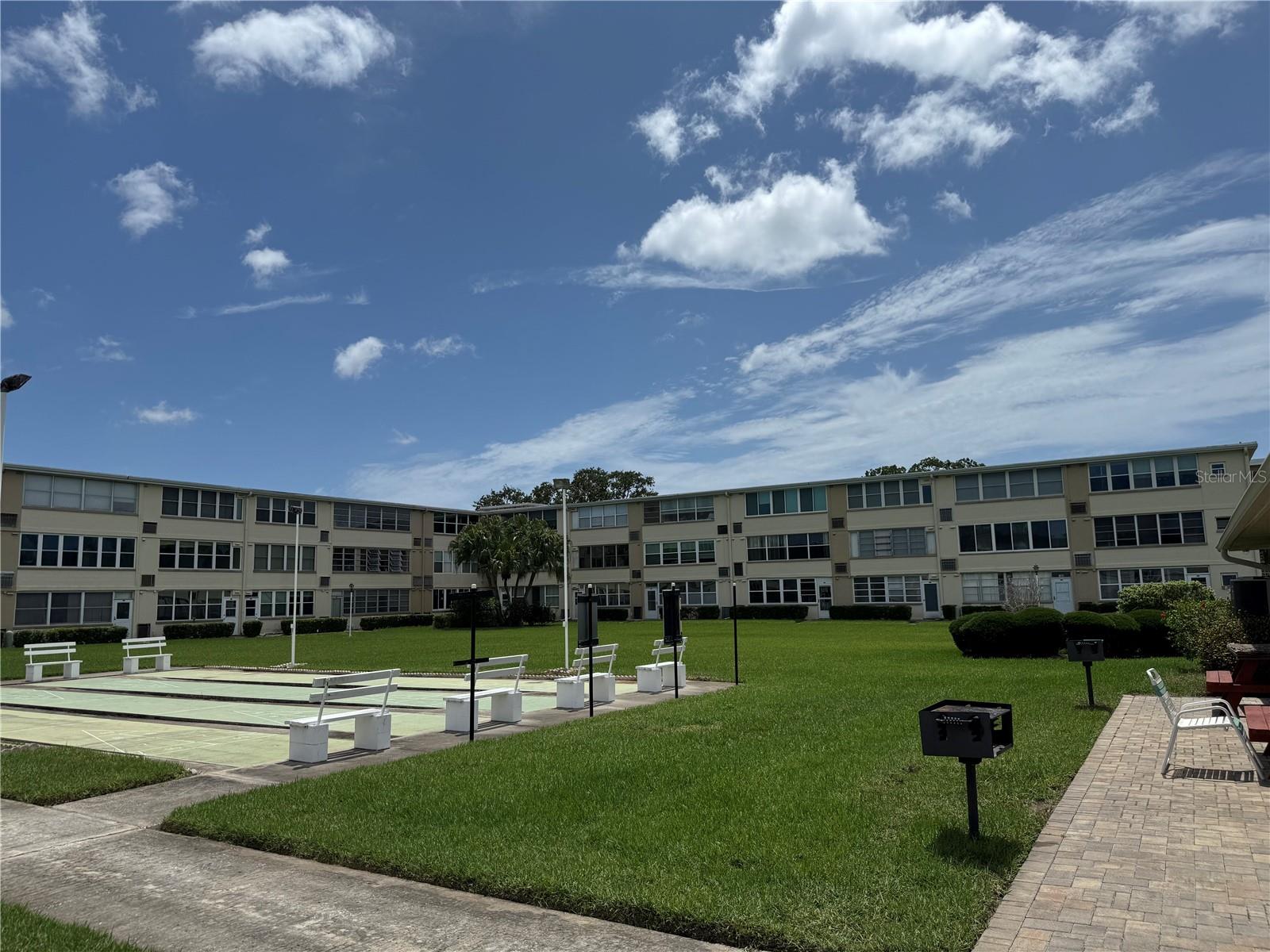 Community center with grill and play area